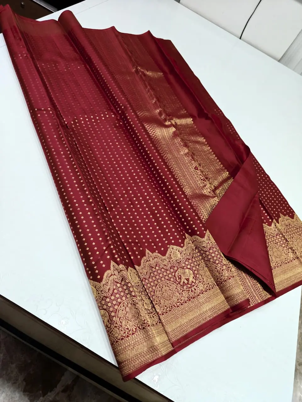 Maroon Kanchipuram Silk Saree with Intricate Gold Zari Woven Border